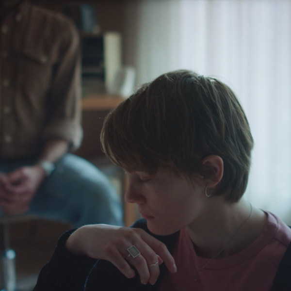 A teenager with a sad look on her face